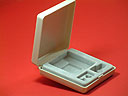 MagniEar Plus plastic container